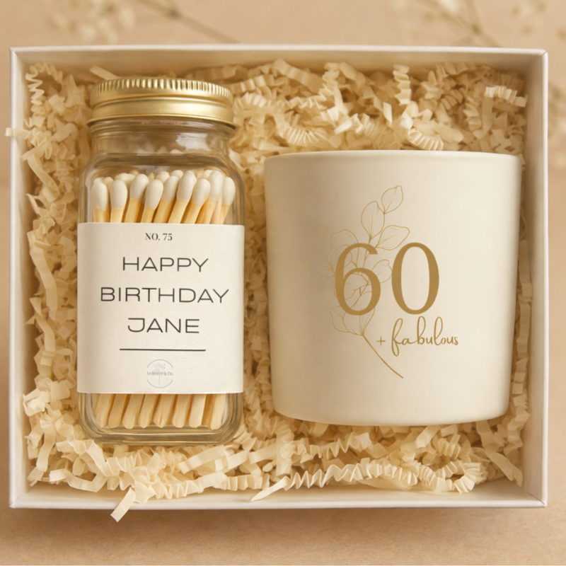 Gift set with a jar of matches and a candle in a box, featuring 'Happy Birthday Jane' and '60 & Fabulous' text.