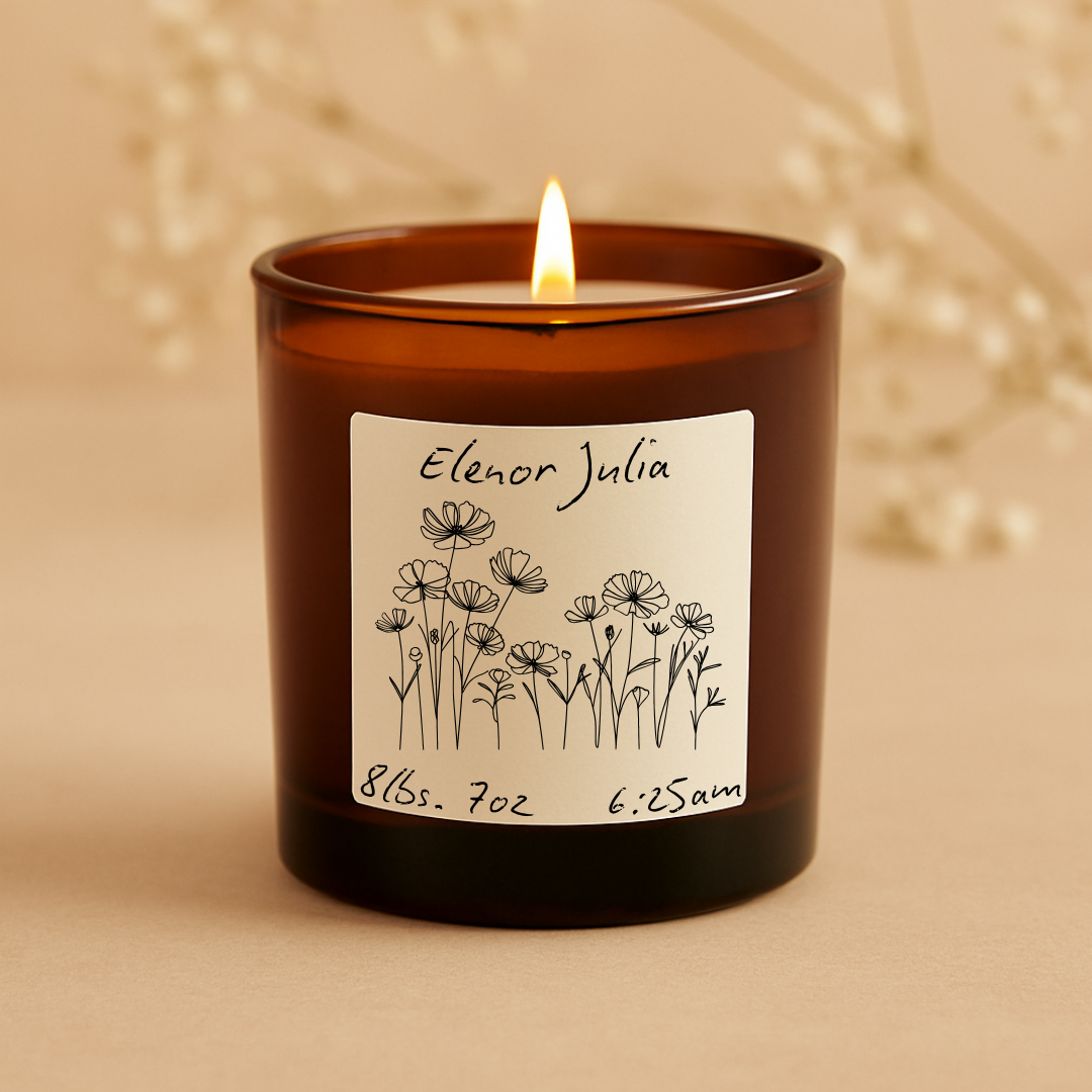 Candle in an amber jar with a decorative label on a beige background