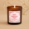Amber glass candle with a pink Galentine's Day label on a beige background